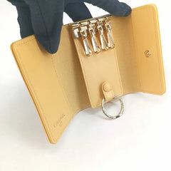 JT400 - CHANEL Yellow Caviar Leather Camellia Flap 4 Key Holder