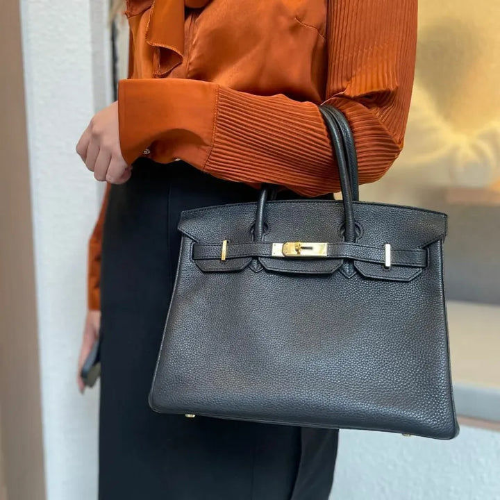 RA075 - HERMES Birkin 30 Black Taurillon Clemence Leather Handbag