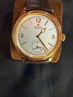 Rolex | 1908 | 52508 | Yellow gold | 39 mm | Crocodile skin | White | Automatic