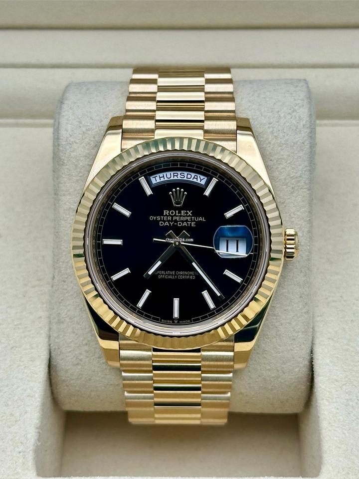 Rolex | Day-Date | 228238 | Yellow gold | 40 mm | Yellow gold | Black | Automatic