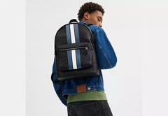 West Backpack In Signature Canvas With Varsity Stripe signature canvas/Gunmetal/Charcoal/Denim/Chalk