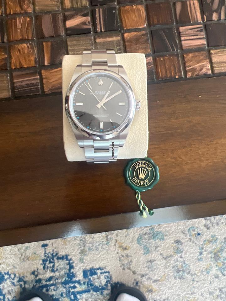Rolex | Oyster Perpetual | 114300 | Steel | 39 mm | Steel | Red | Automatic