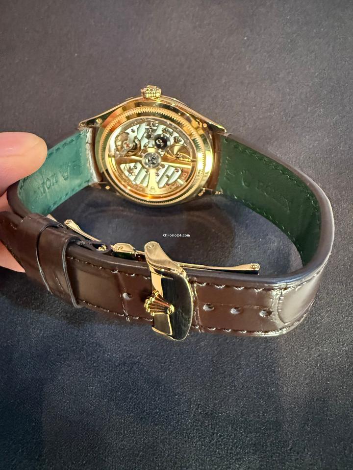 Rolex | 1908 | 52508 | Yellow gold | 39 mm | Crocodile skin | White | Automatic