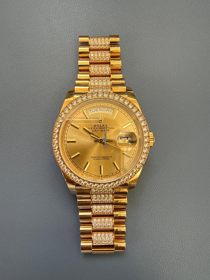 Rolex | Day-Date | 128348RBR | Yellow gold | 36 x 43 mm | Yellow gold | Champagne | Automatic