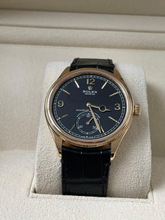 Rolex | 1908 | 52508 | Yellow gold | 39 mm | Crocodile skin | Black